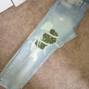 Levis Men's Distressed Light Blue Jeans with Camo Patch